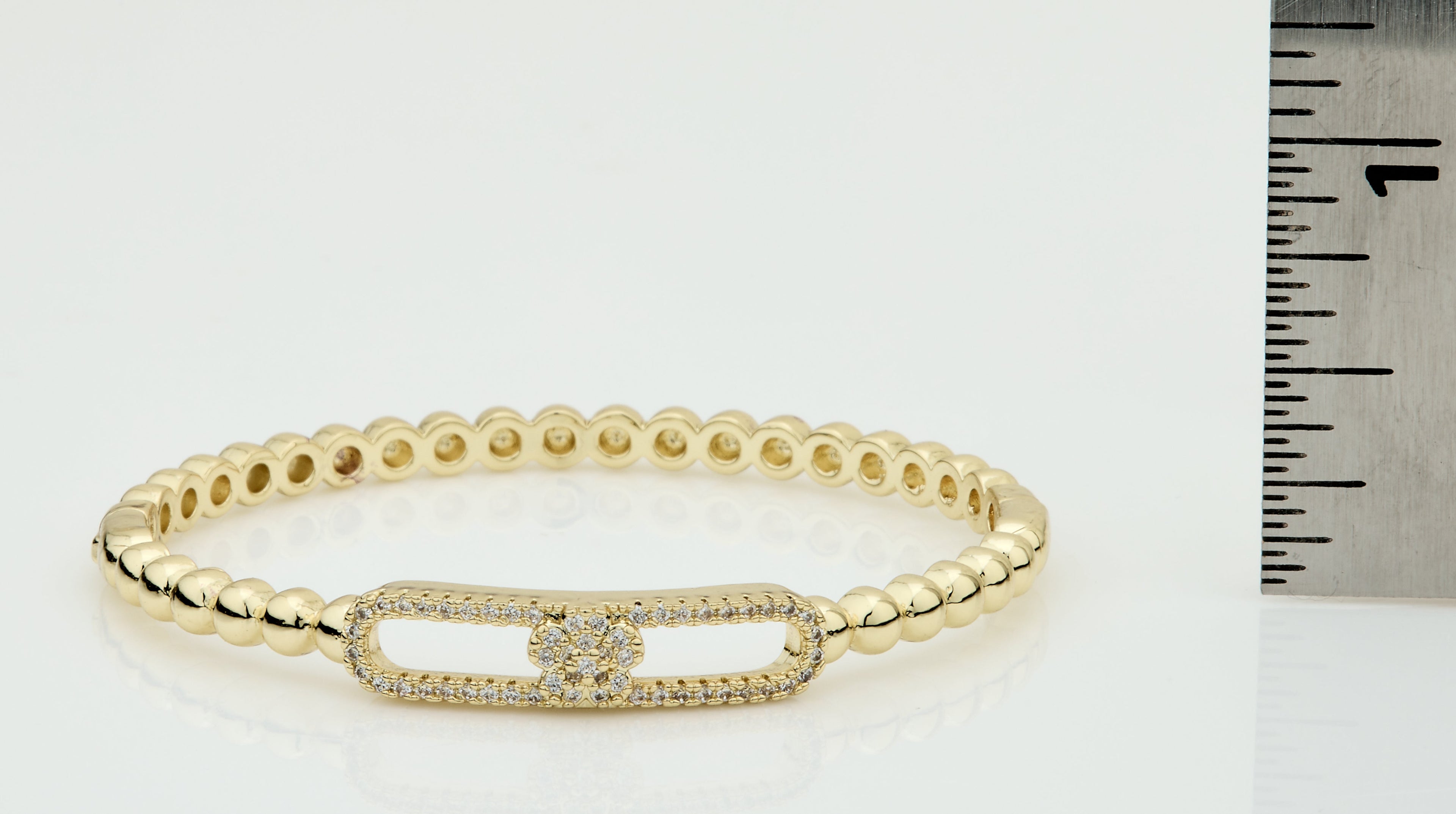 14K Gold Plated Oval Bead Clasped Bangle Accented With Cz Flower Bar Center