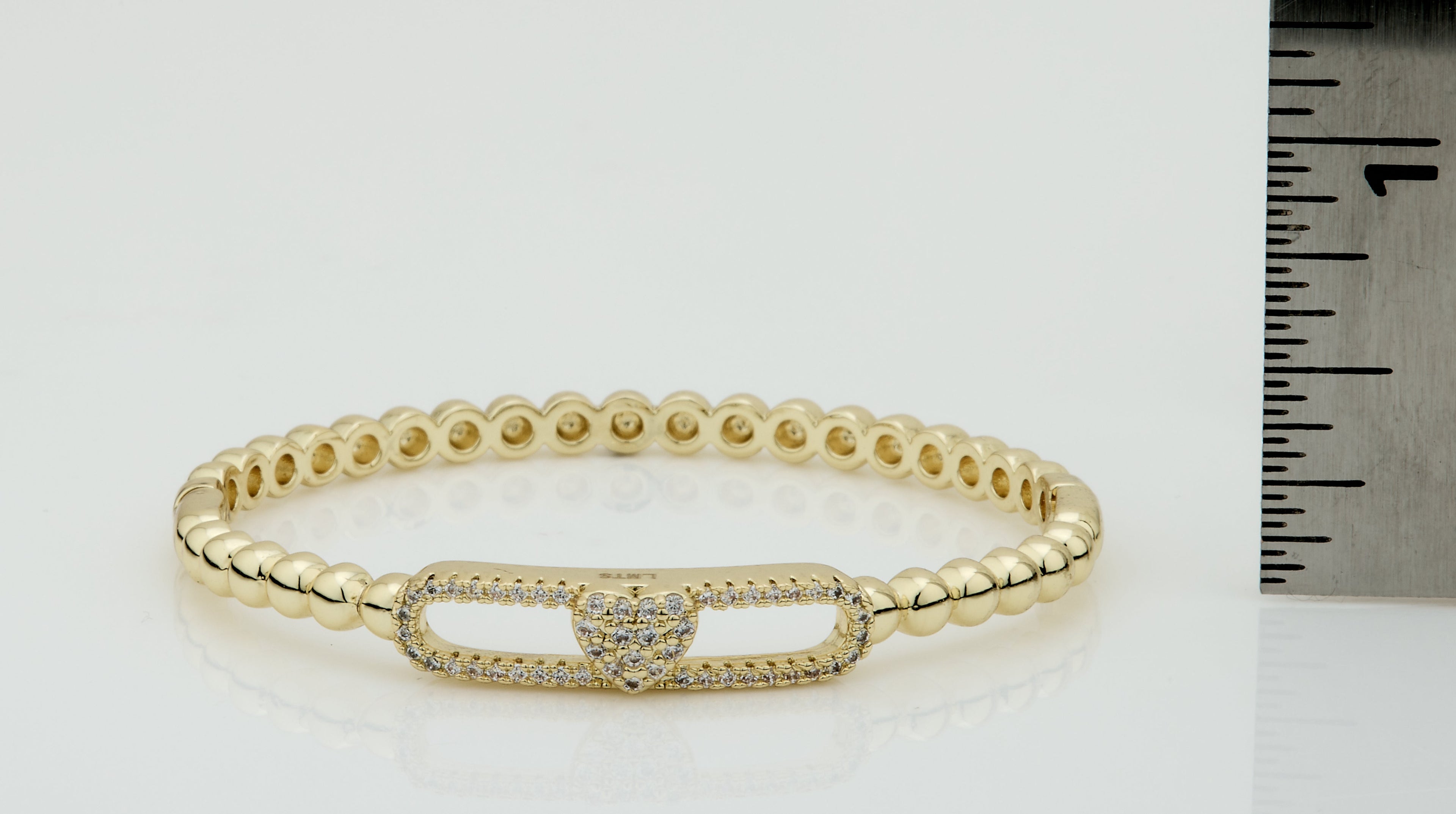 14K Gold Plated Oval Bead Clasped Bangle Accented With Cz Heart Bar Center