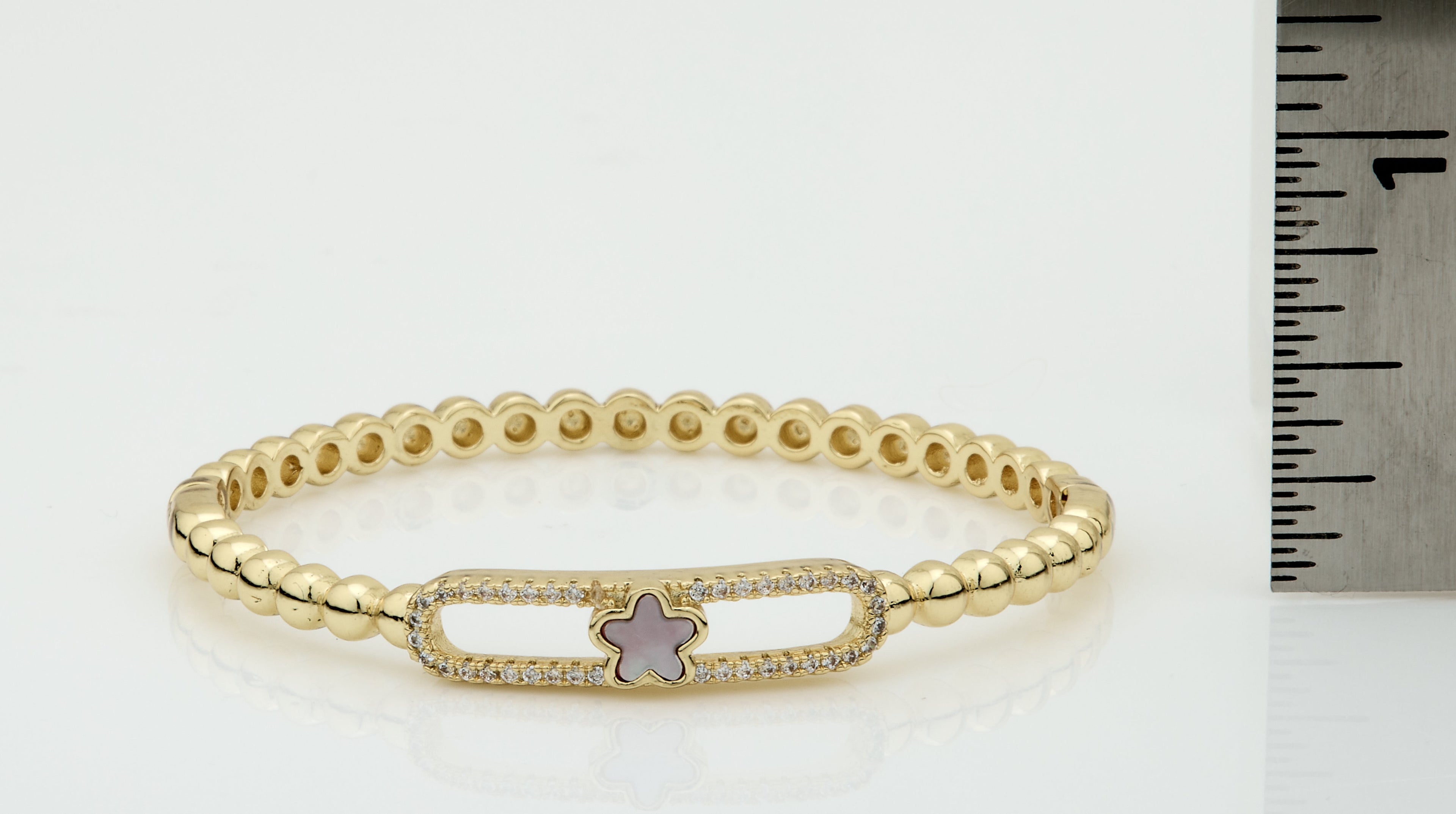 14K Gold Plated Oval Bead Clasped Bangle Accented With Cz & Mother Of Pearl Flower Bar Center